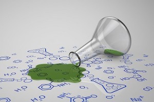 La importancia de los derrames en el laboratorio Líquido verde derramado del tubo de ensayo